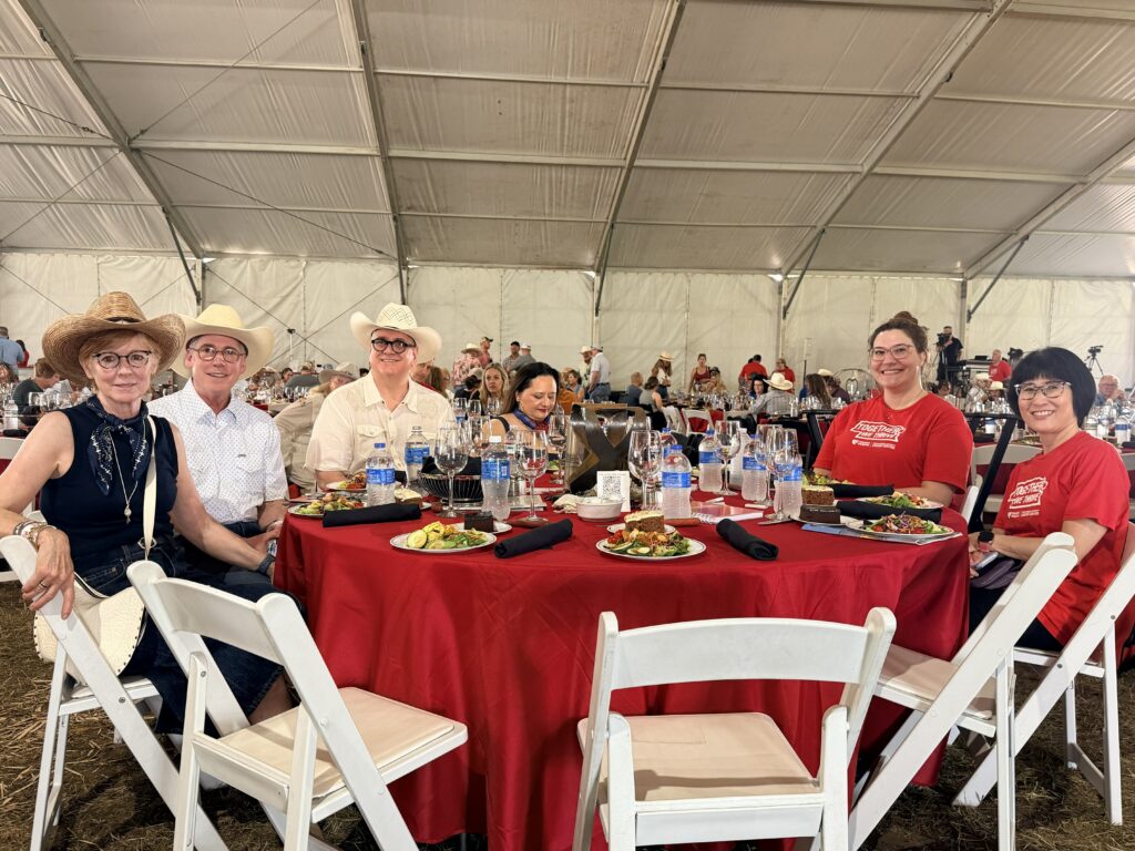 Cancer center faculty and staff at a dinner table