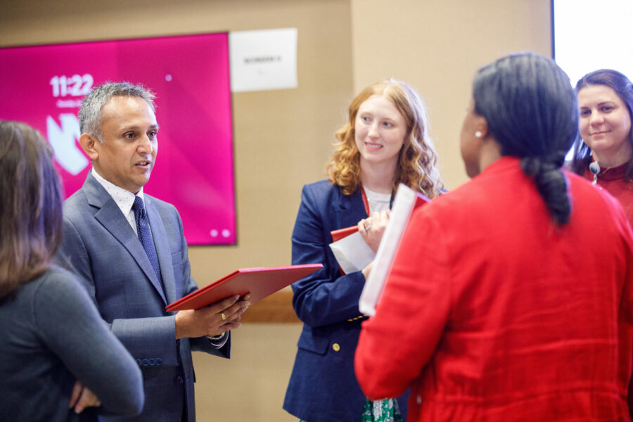 Chittalsinh Raulji&comma; MBBS&comma; associate professor in the UNMC Department of Pediatrics&comma; presents an iLEAD graduation certificate to cohort-mate Brandi Flagg&comma; MD&comma; assistant professor in the UNMC Department of Internal Medicine&period;