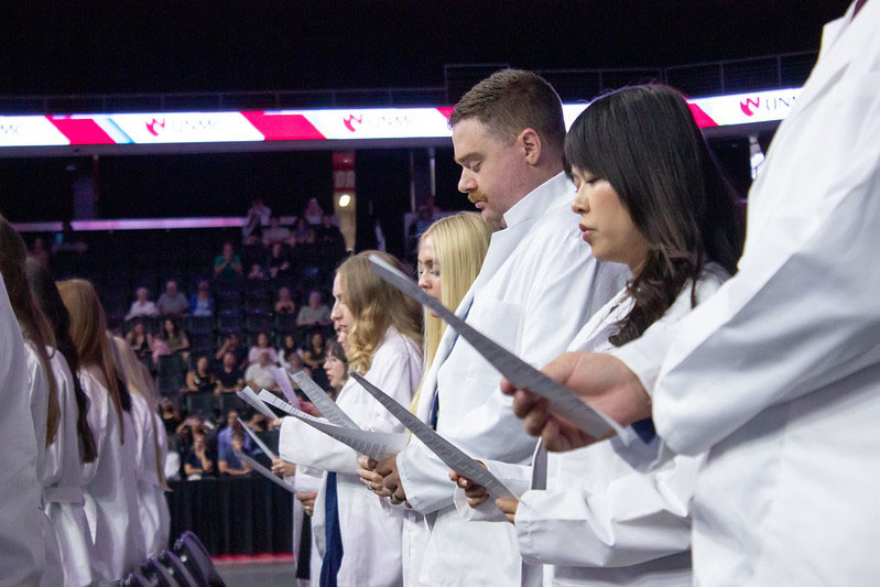 UNMC College of Allied Health Professions' students read the "Pledge of a Healthcare Professional" at the college's White Coat Ceremony&period; &lpar;Photo by Fran Higgins&rpar;&period;