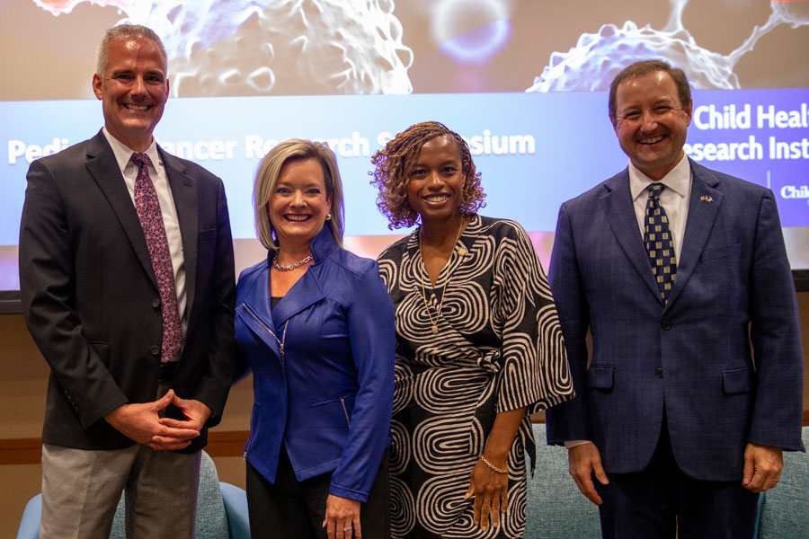From left&comma; Don Coulter&comma; MD&comma; PCRG director&semi; Chanda Chac&oacute;n&comma; president and chief executive officer&comma; Children's Nebraska&semi; Nebraska State Senator Ashlei Spivey&semi; and Chris Kratochvil&comma; MD&comma; UNMC vice chancellor for external relations&period;