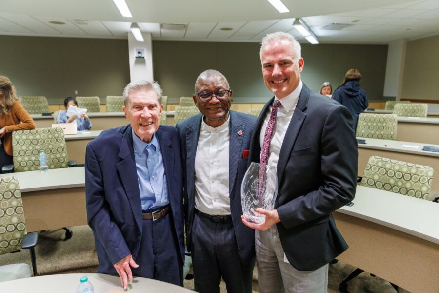 From left&comma; Bob Bartee and UNMC Chancellor H&period; Dele Davies&comma; MD&comma; congratulate Don Coulter&comma; MD&comma; on his Bartee Family Advocacy of Science Award&period;
