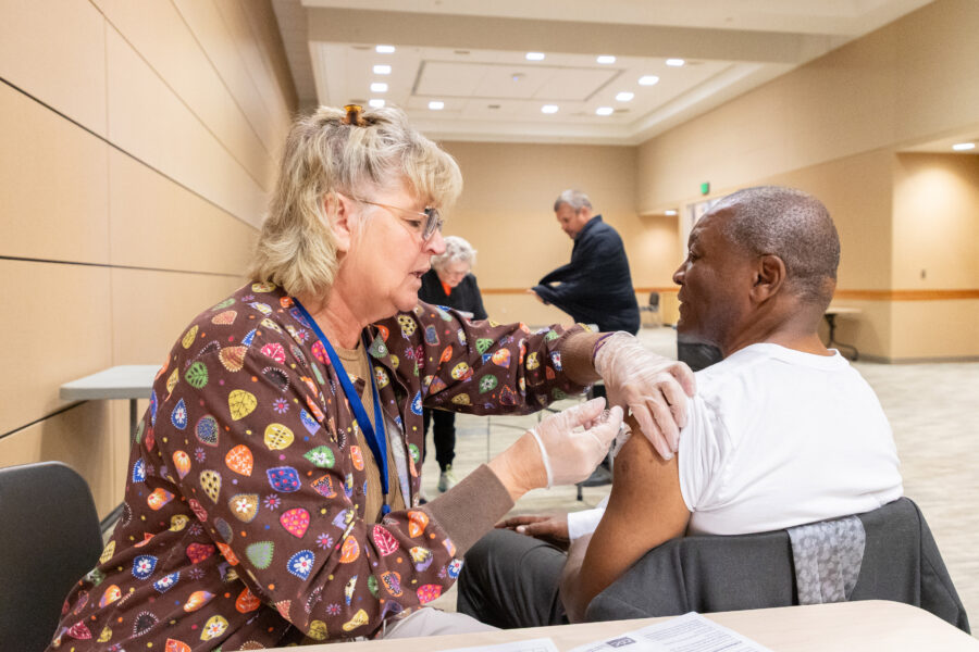 UNMC Chancellor H&period; Dele Davies&comma; MD&comma; received his flu vaccination at the Oct&period; 14 clinic at the UNMC Omaha campus&period;