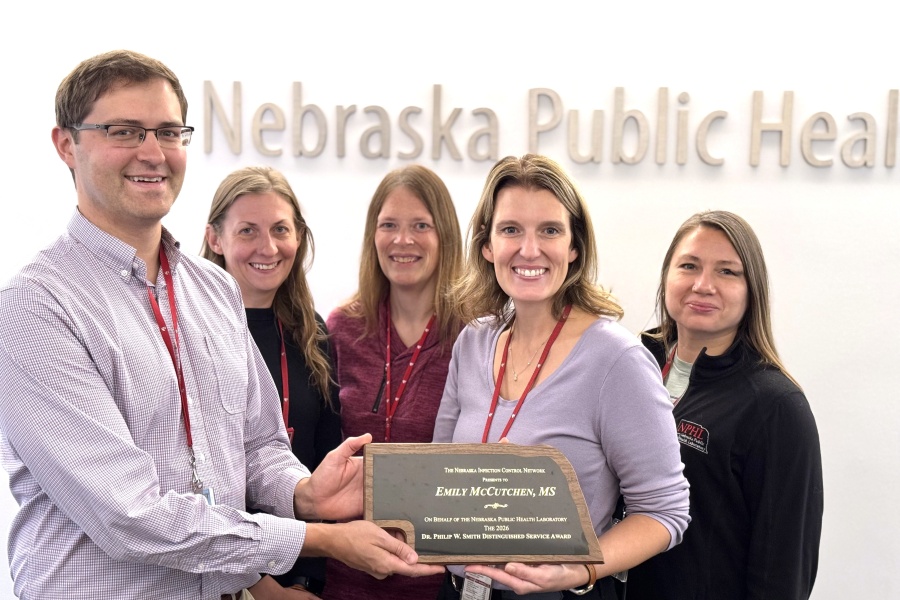 From left&comma; Dr&period; Richard Hankins&comma; Nebraska Infection Control Network president and assistant professor in UNMC's Department of Infectious Diseases&comma; with NPHL team members Stevie McGill&comma; Amanda Bartling&comma; Emily McCutchen and Amy Roden