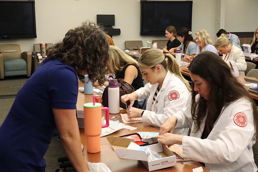 Post graduate student learn advanced nursing skills.