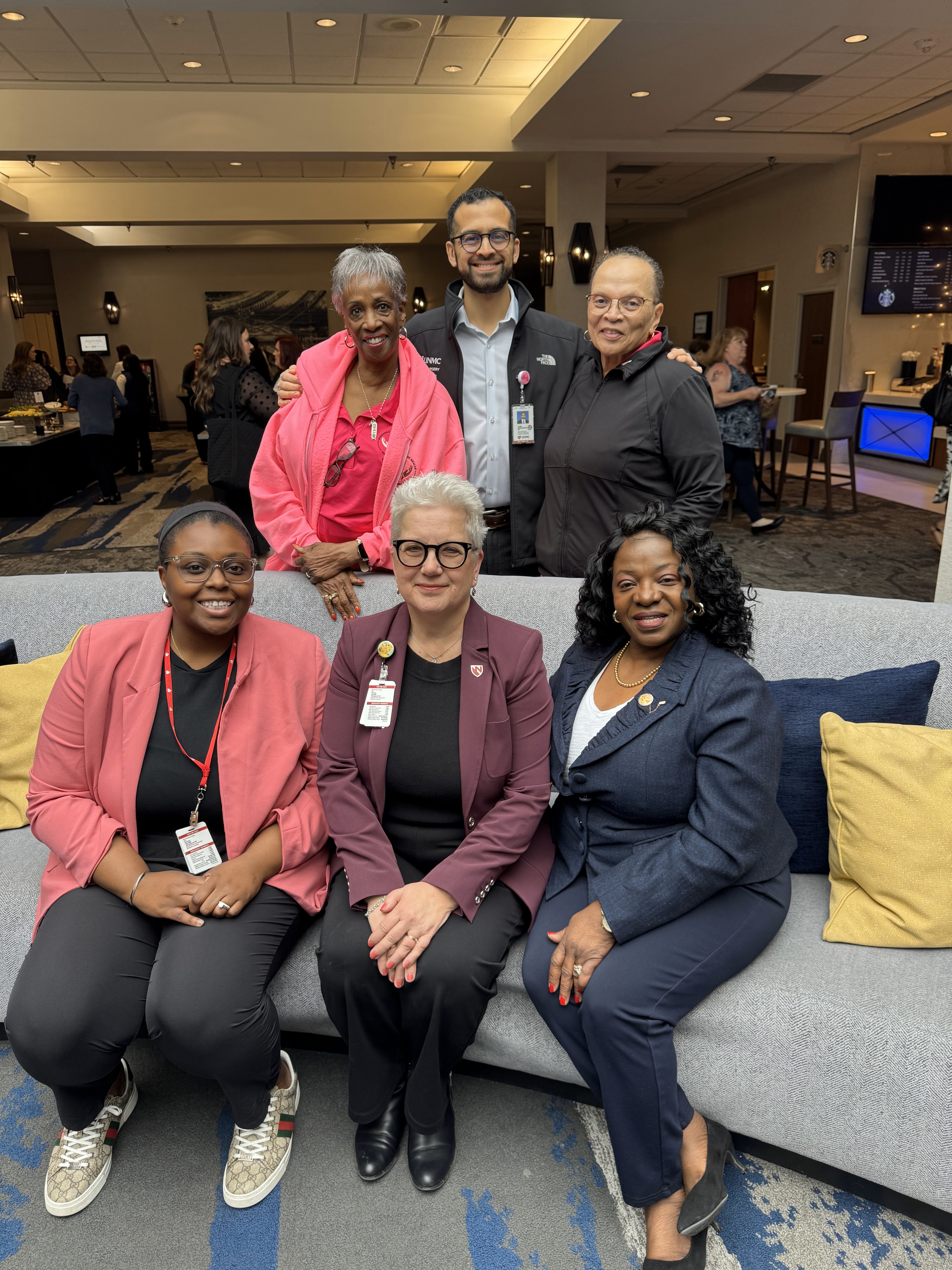 Pictured left to right back Phyllis Mitchell Butler, Dr Juan Santamaria, Julia Weathers and front left to right Kia Scott Sellers (PhD student CON), Dr Robin Lally, and Dr Linda Smith. Phyllis and Julia are Administrative Navigator Coordinators. Dr Smith is Clinical Director at NOAH and voluntary faculty at UNMC CON. Dr. Lally, Dr. Smith, and Kia are CRISP members.