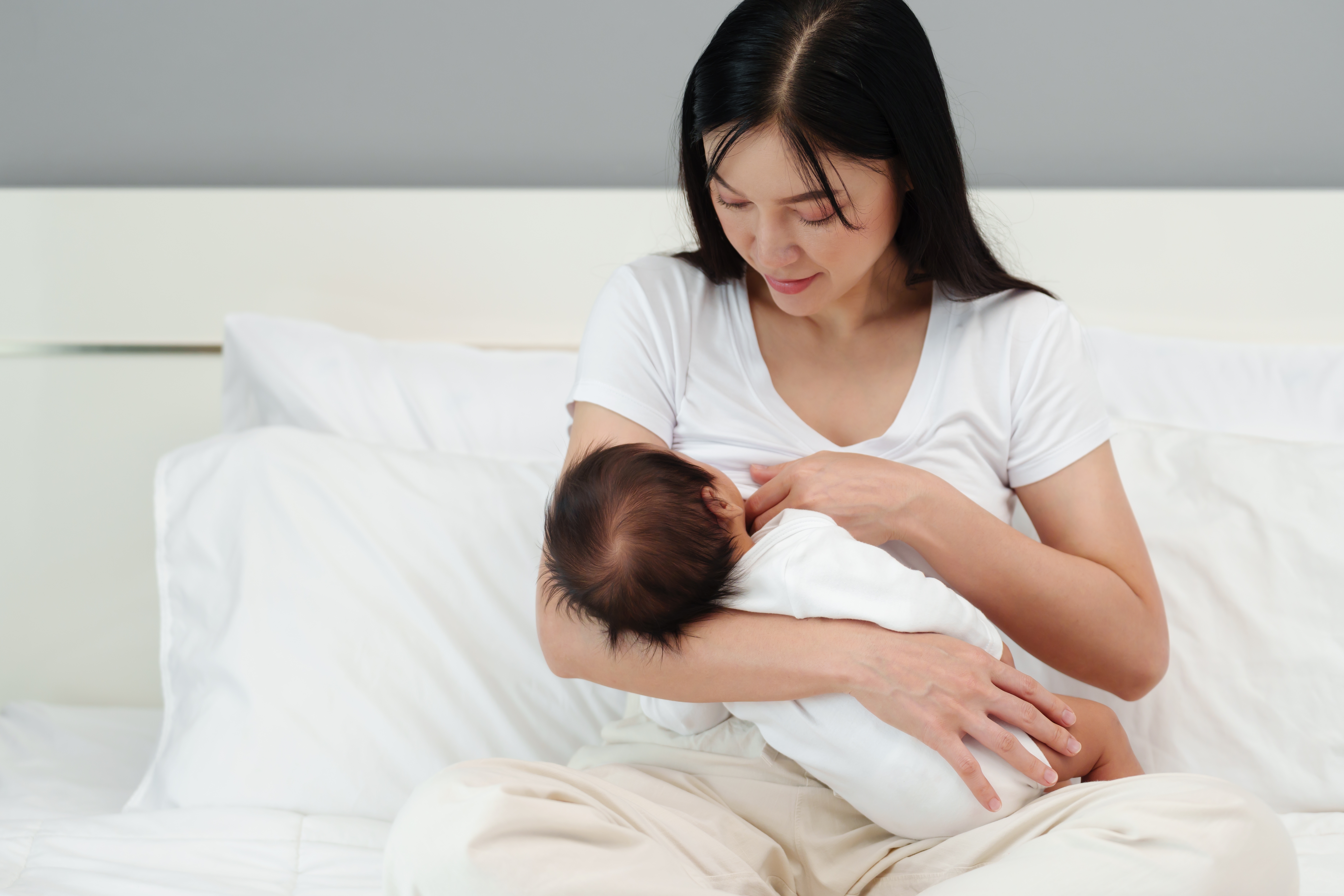 Woman breastfeeding her baby