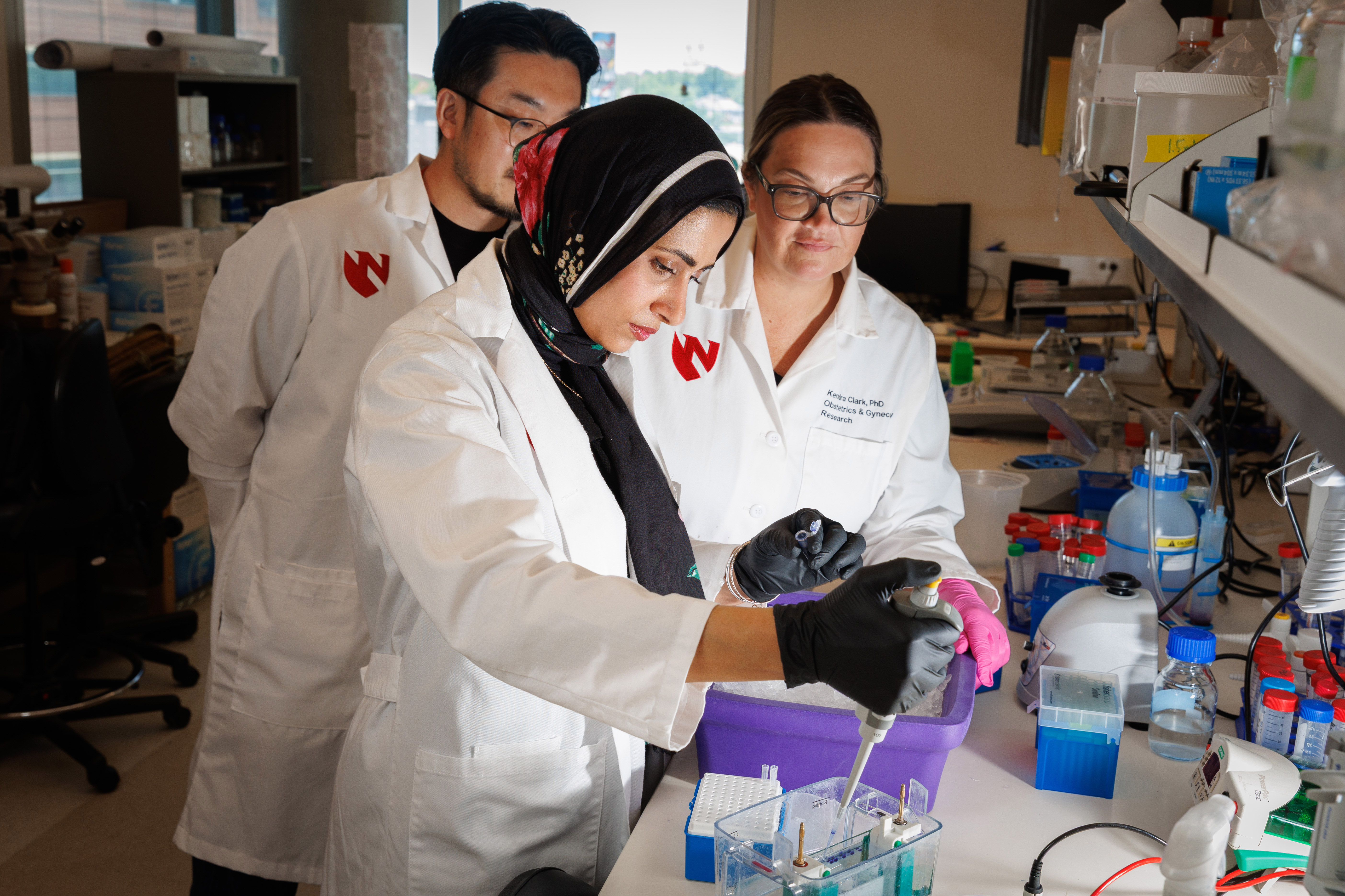 Kendra Clark, PhD, and lab members conducting research