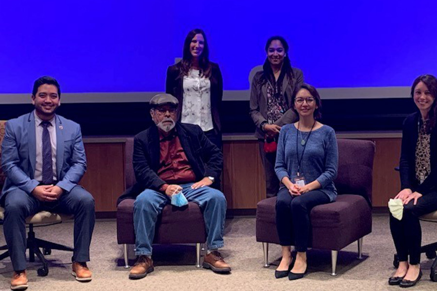 Panelists pose for a picture at a Hispanic Heritage Month event