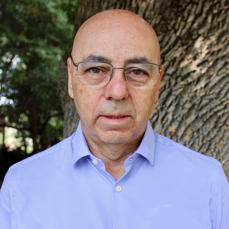 Juan Carlos Veloso poses for a headshot