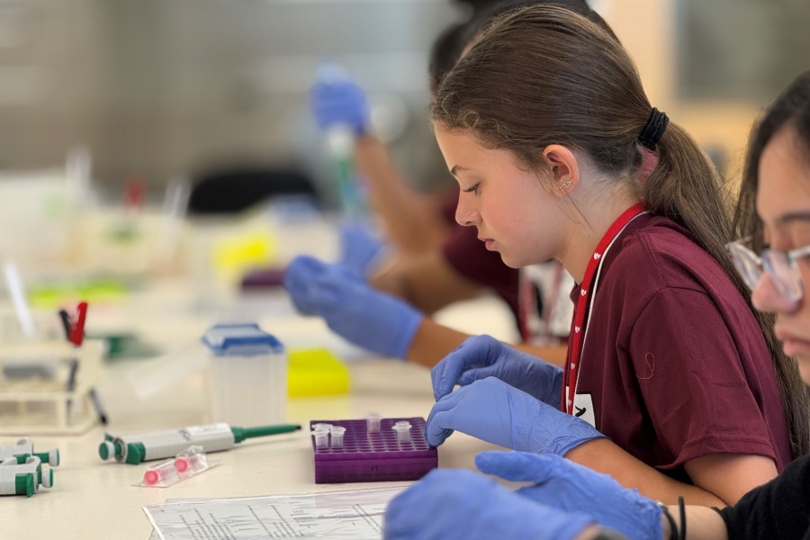 Girls work at lab table