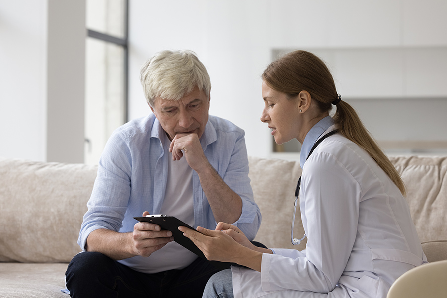 Healthcare provider counseling a patient