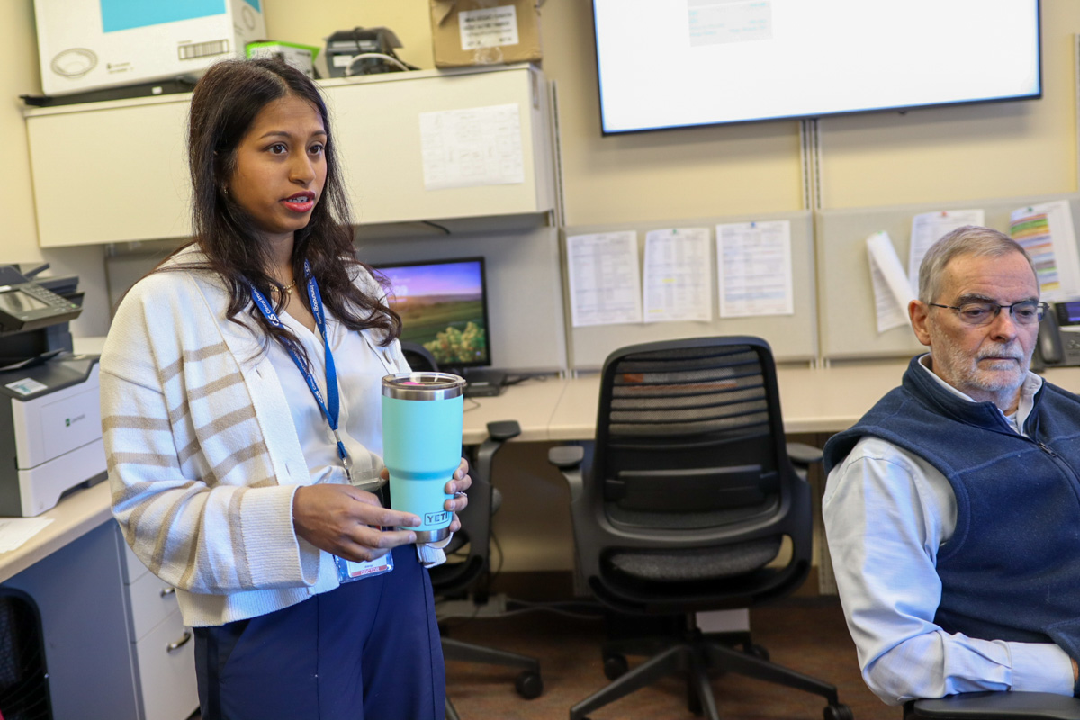 Two Doctors look at computer monitor