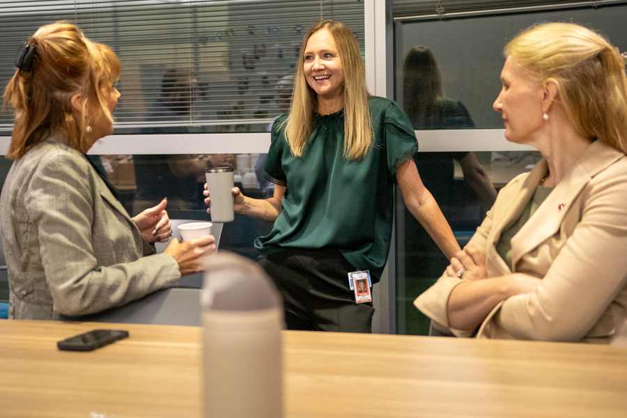 Drs. Ann Anderson Berry, Kari Simonsen and Ruben Quiros sitting at table