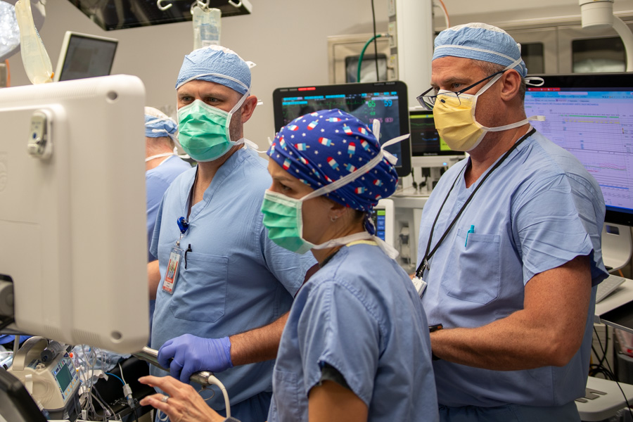 doctor looking at medical equipment