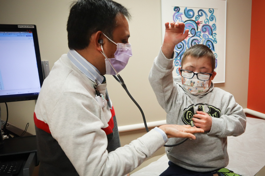 Physician examining a patient