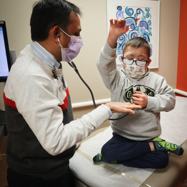 Hematology/oncology doctor treating patient.