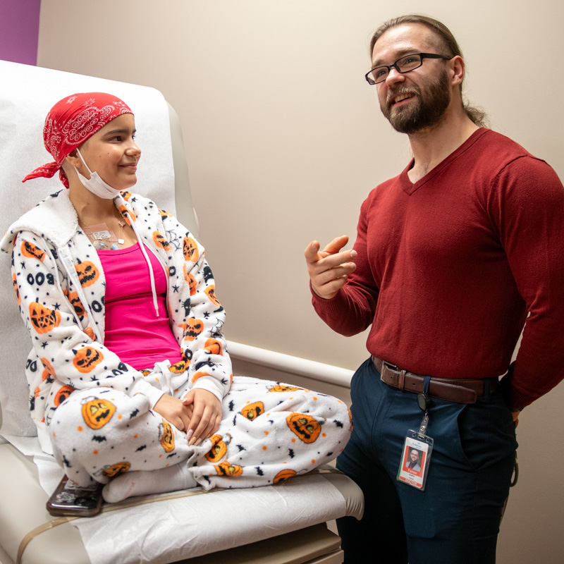 fellows and patient looking up at monitor