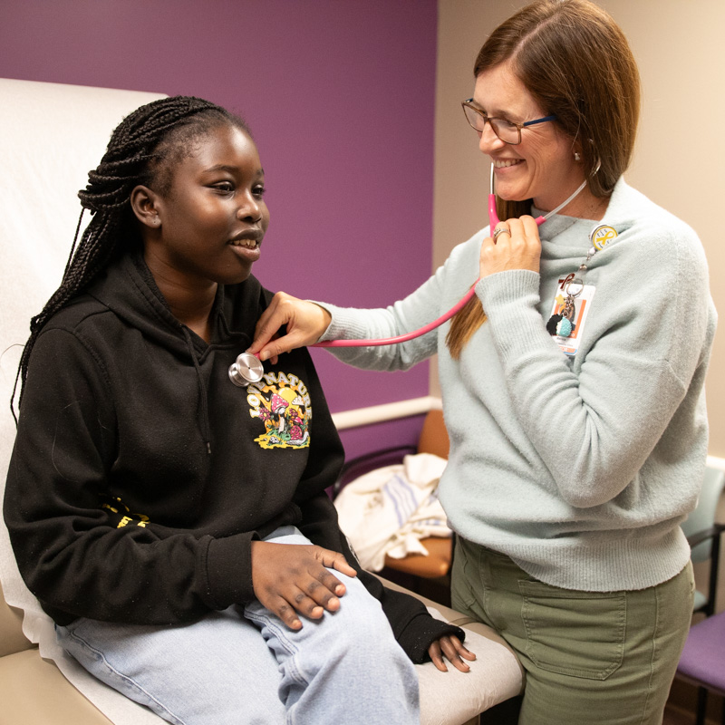 Hematology/oncology doctor treating patient.