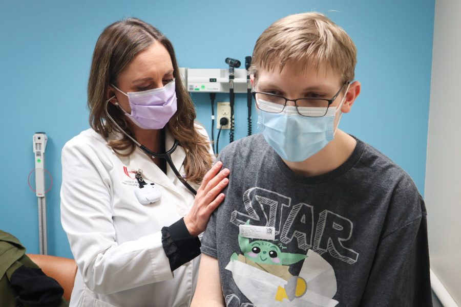 Physician examining a patient