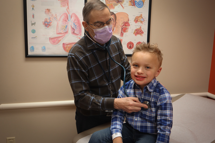 Physician examining a patient