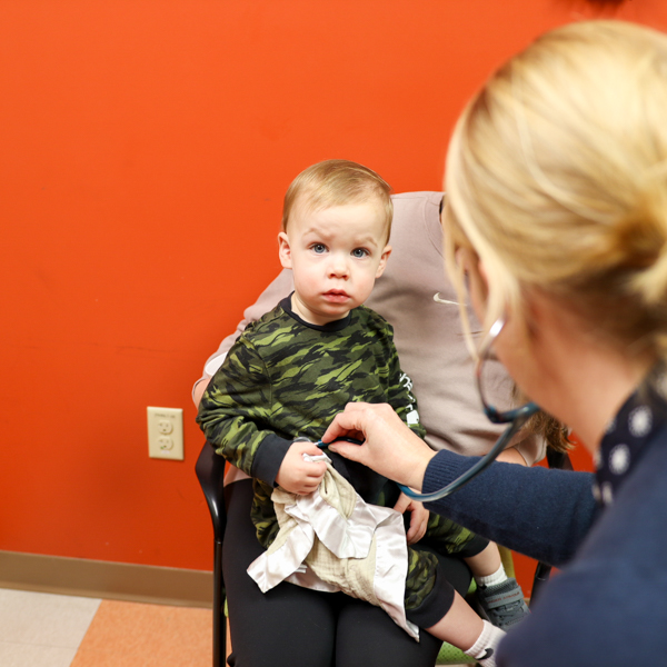 Pulmonology doctor examining patient.