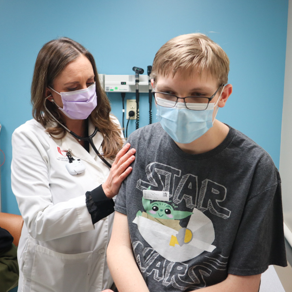 Infectious diseases physician treating patient