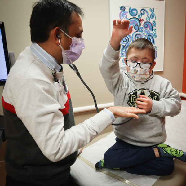 Hematology/oncology doctor treating patient.