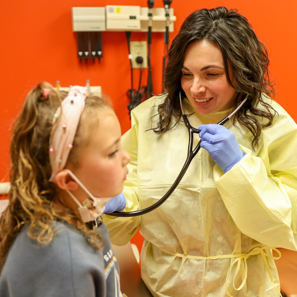Pulmonology doctor examining patient.
