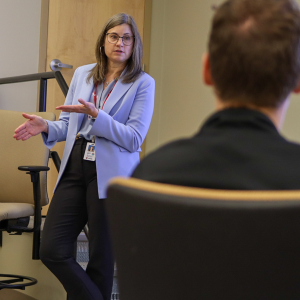 Dr. Haney talking to a class of fellows