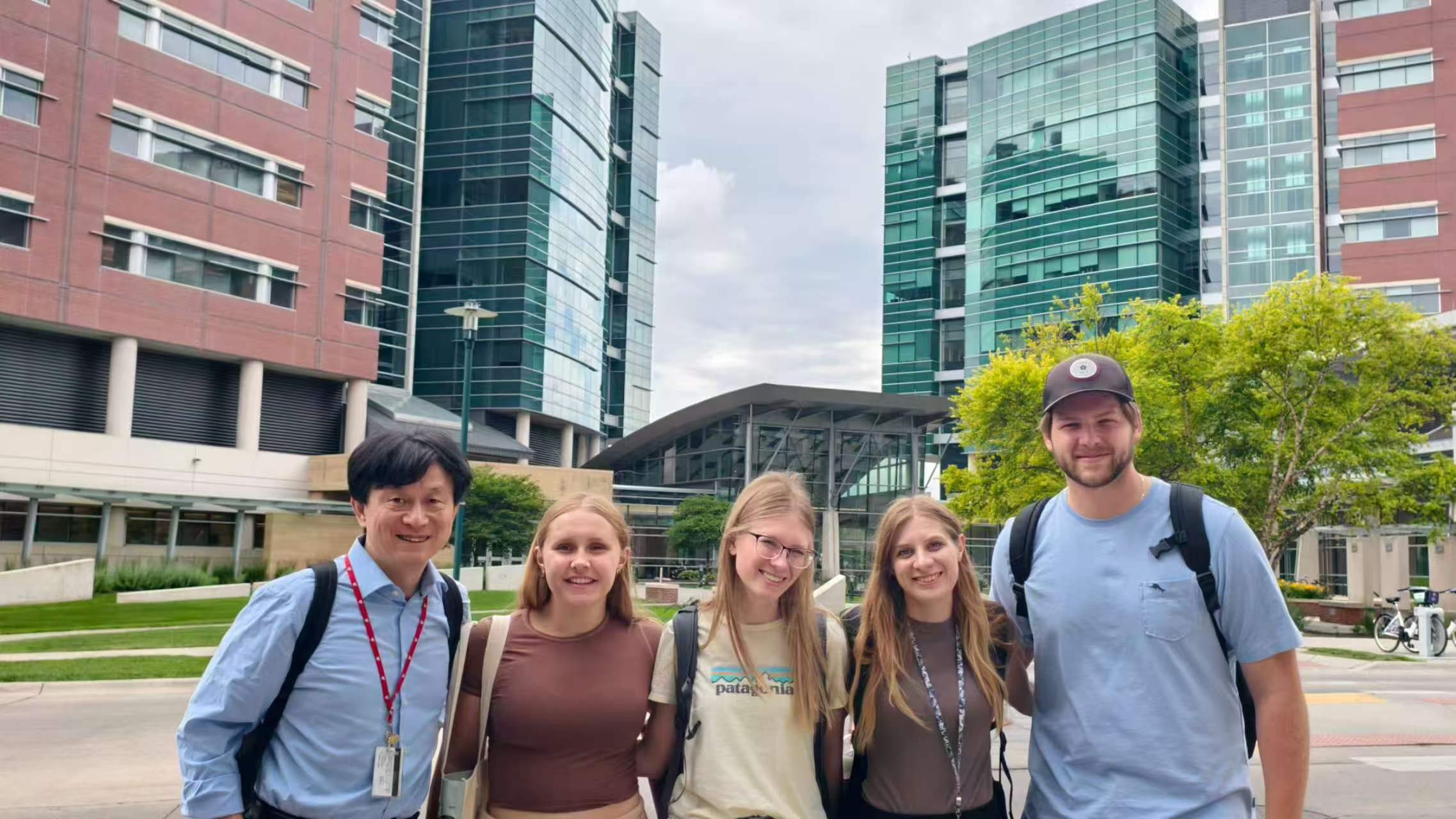people standing in front of Durham Research Buildings