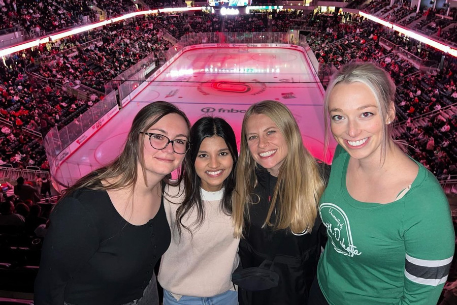 Doctor presenting child with toy 