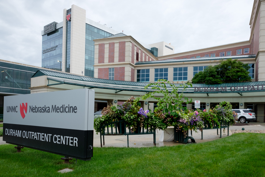 UNMC campus with flowers in foreground