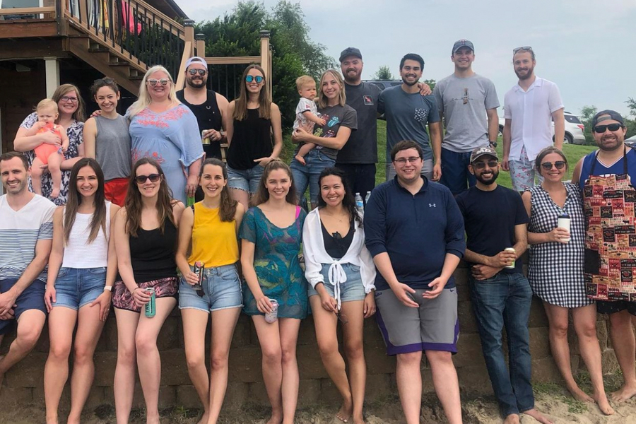 residents at lake house posed in group