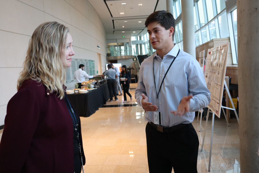 researcher and Dr. Kari Simonsen poster Session