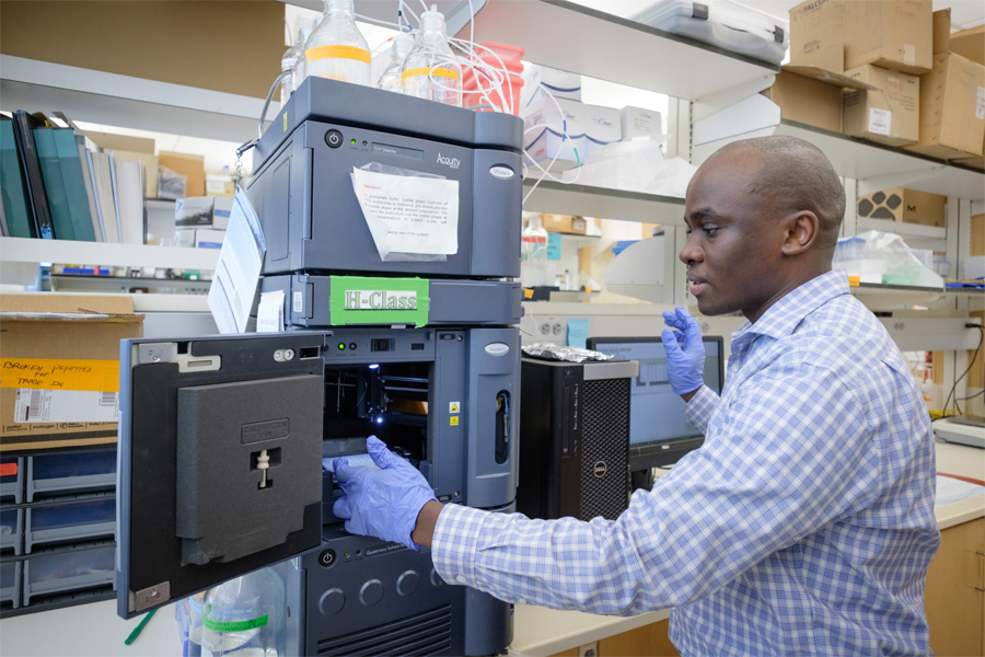 Dr. Benson Edagwa works in his lab