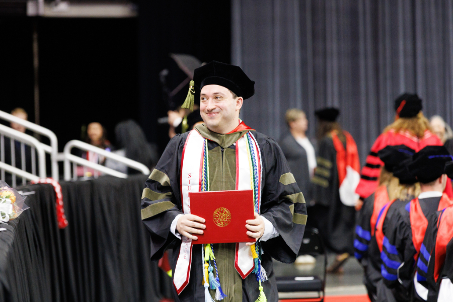 a student wearing her graduation regalia