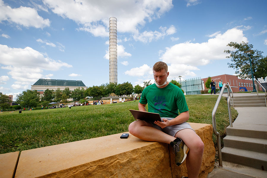 student studying on campus