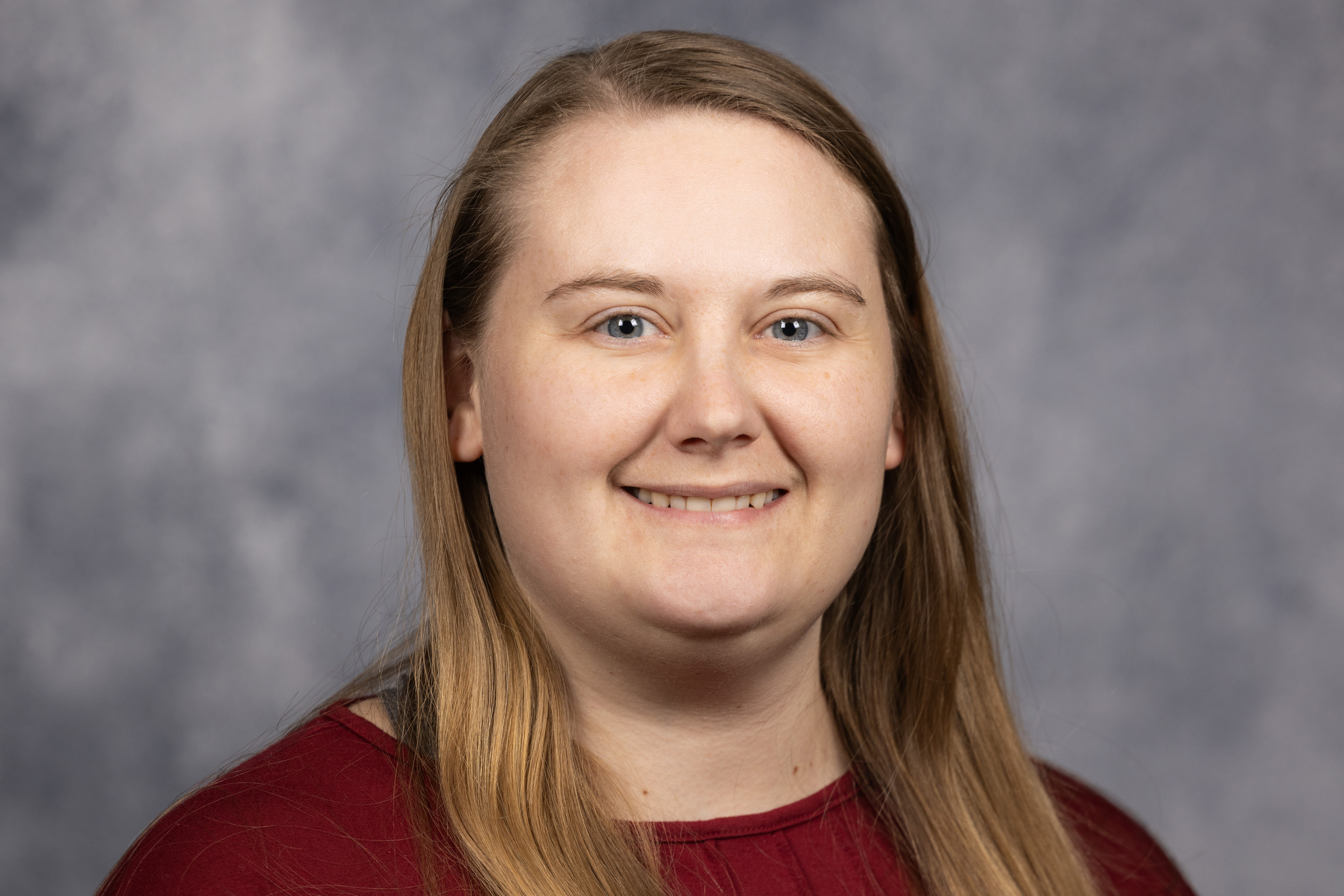 Valerie Fousek-Schuller smiles at the camera