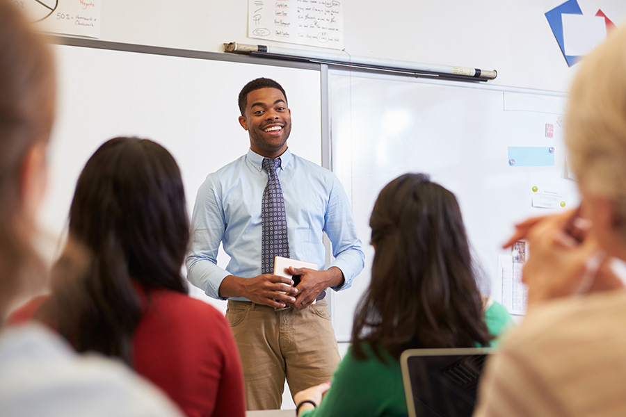 Teacher standing in front of class