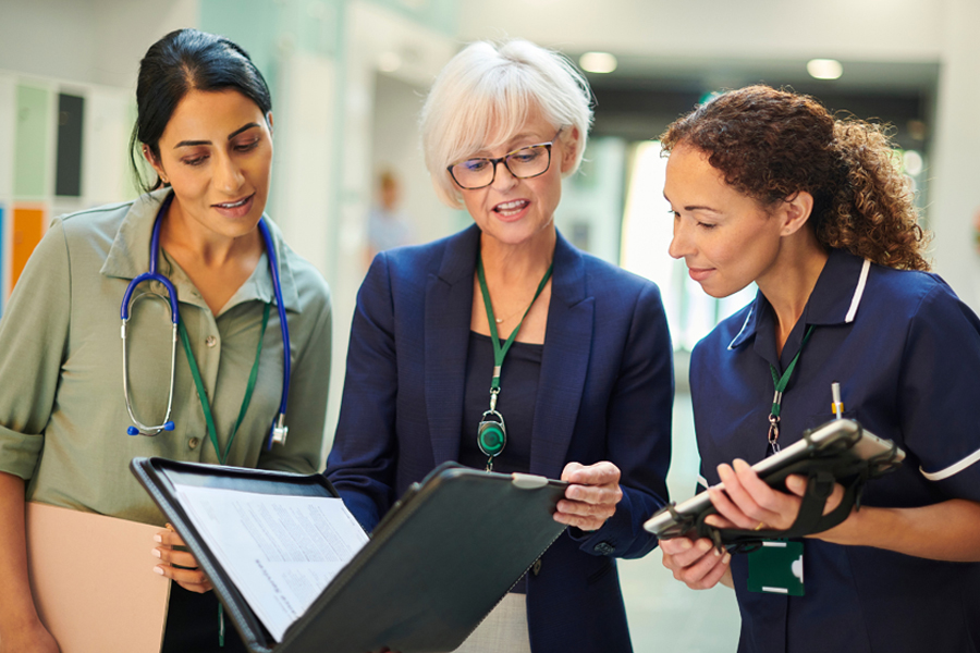 Health administrators huddled talking