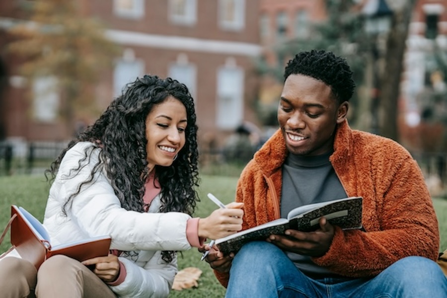 Two students sitting together.