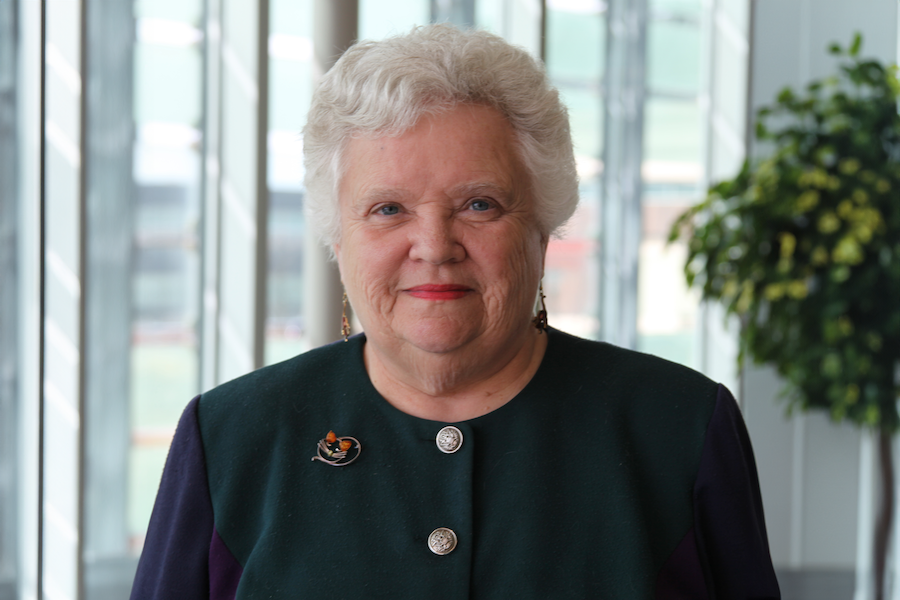 A professional headshot of Dr. Rogan.