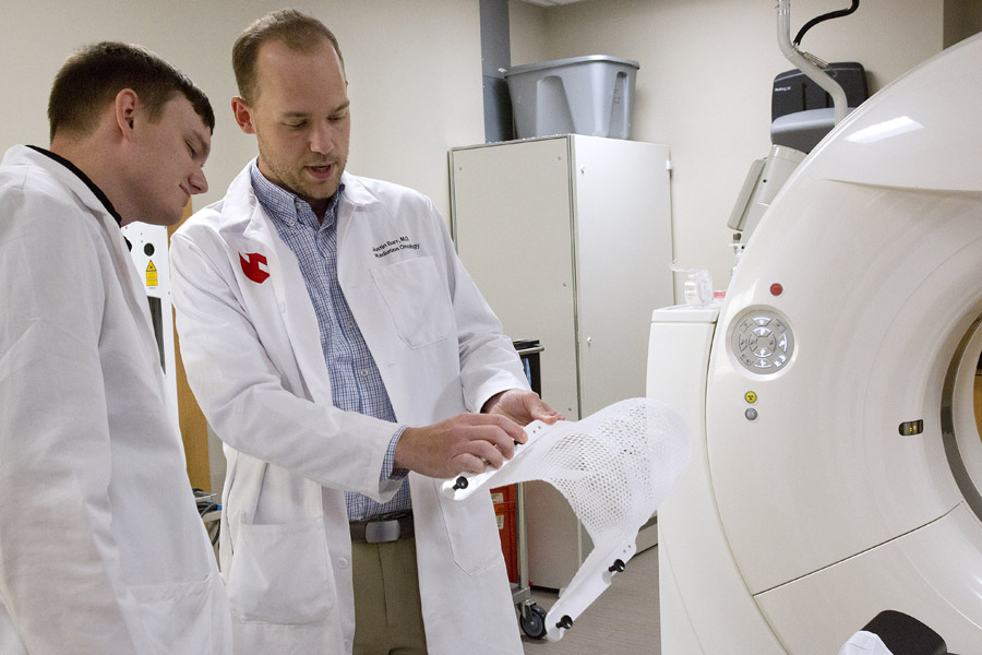 Residents at CT scanner