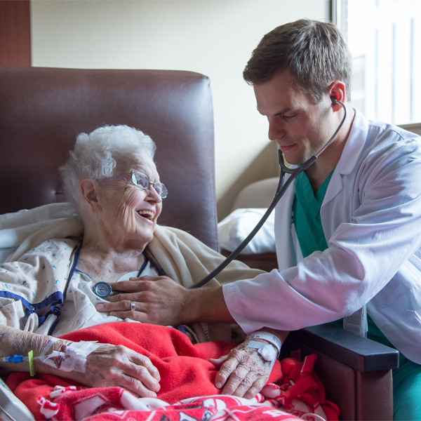 physician with elderly patient
