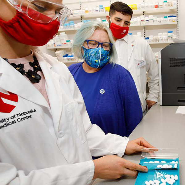 pharmacy students learning in the lab