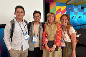 student writing on an interactive learning board