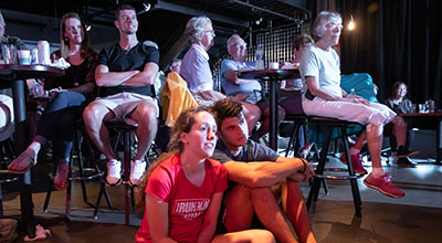 An audience listens to a Science Cafe speaker