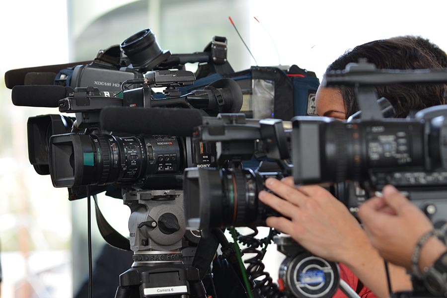 Cameras at a press conference