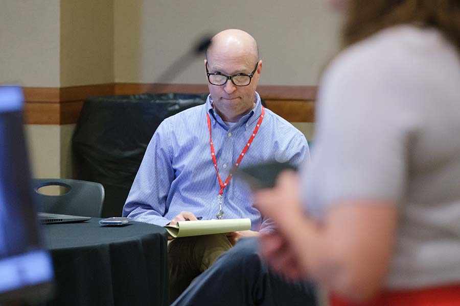 UNMC Today Editor Jeff Rob takes notes an event.