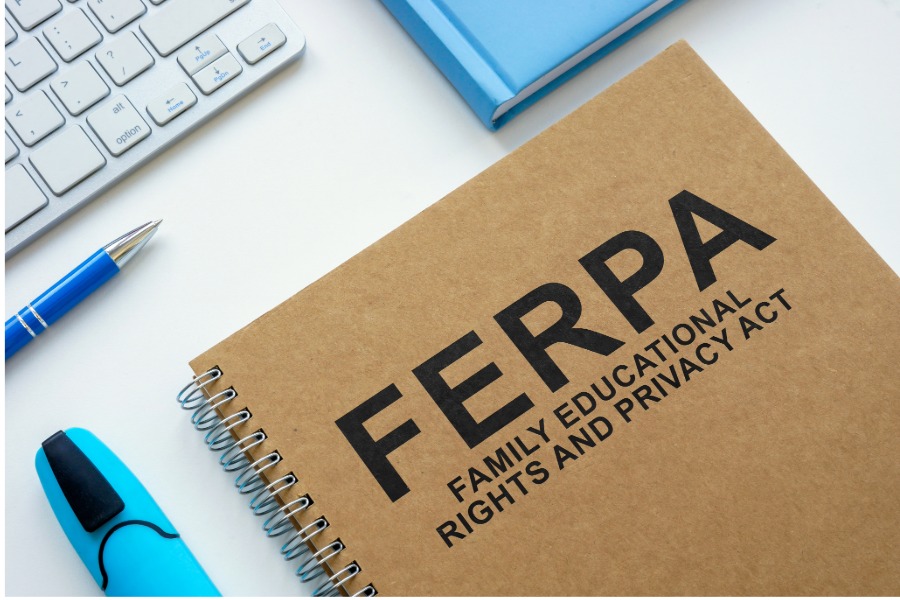 FERPA Family Educational Rights and Privacy Act, pens, keyboard, notebook